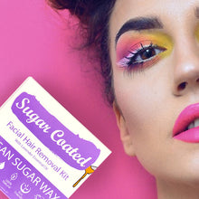 Load image into Gallery viewer, Sugar Coated Facial vegan sugar wax on pink background next to lady&#39;s face with hot pink lipstick and vibrant multi-coloured eye shadow
